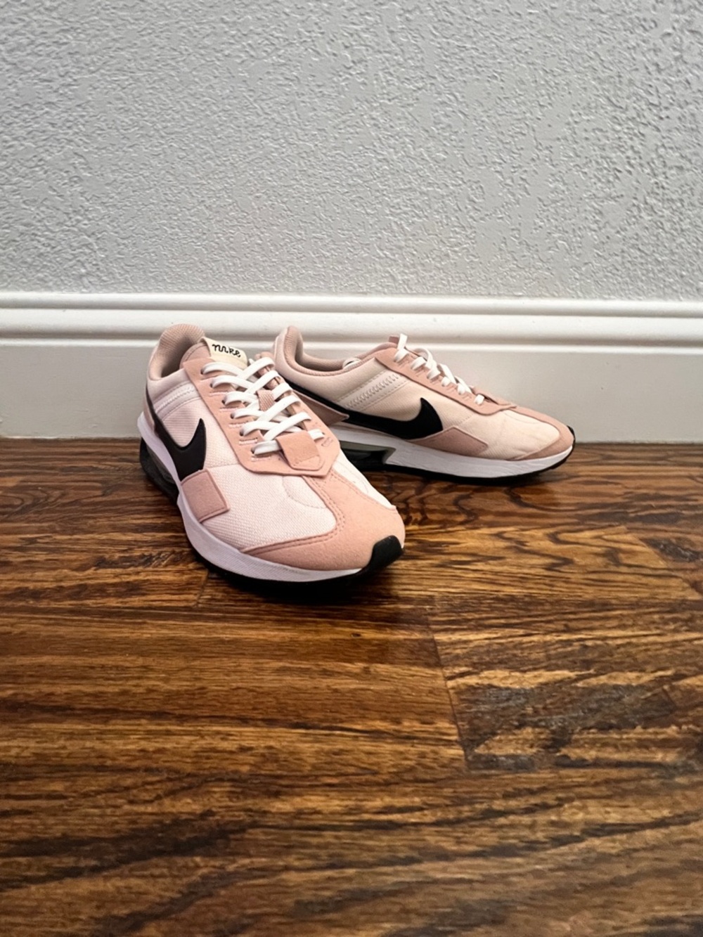 Nike Women's Soft Pink and Black Runner Sneakers